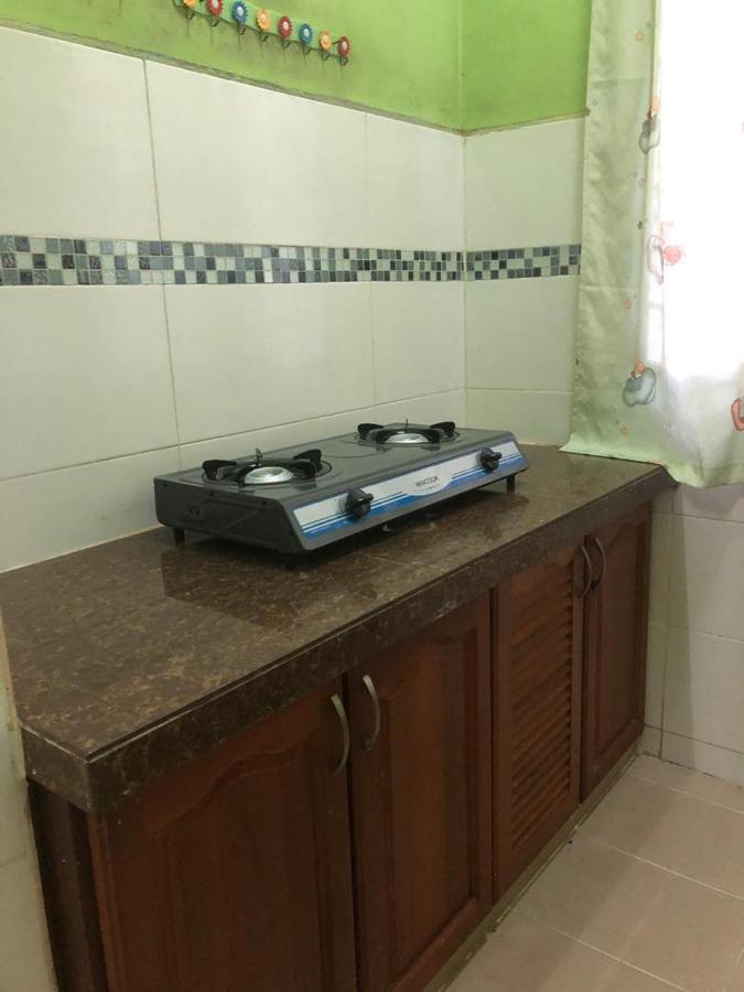 Afza Homestay Sura Free Unifi Kampong Sura Masjid Bagian luar foto